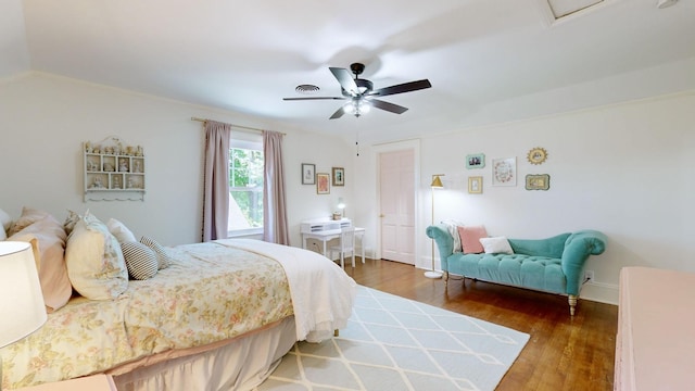 bedroom featuring ceiling fan and dark hardwood / wood-style flooring