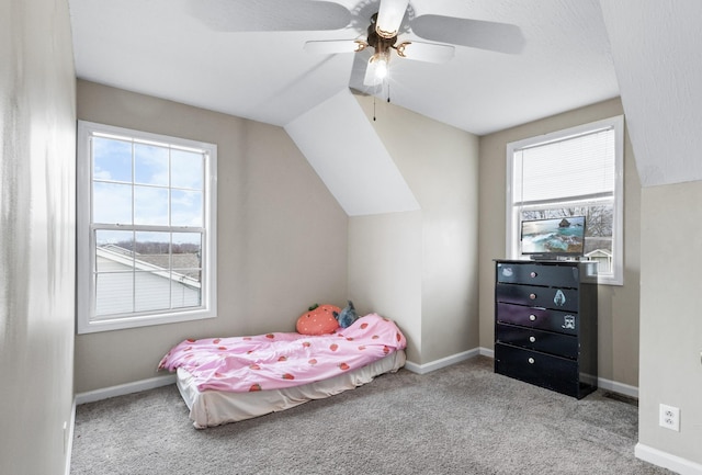 bedroom with ceiling fan, light carpet, and lofted ceiling