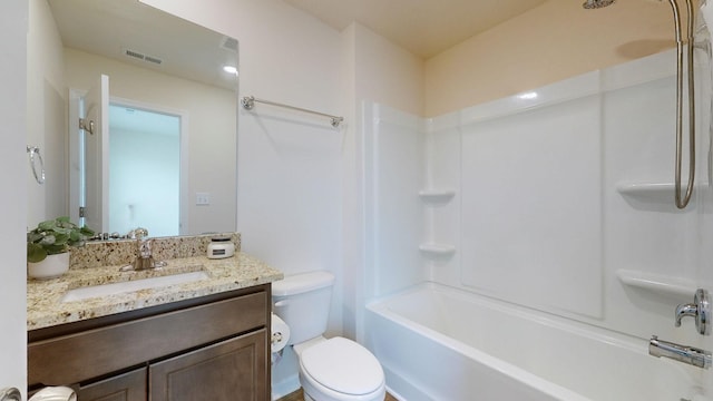 full bathroom featuring vanity, toilet, and bathing tub / shower combination