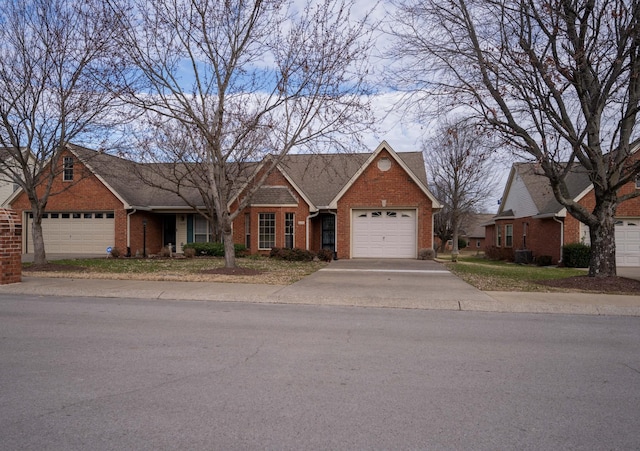 ranch-style home featuring a garage