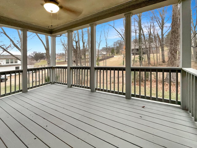 wooden terrace with ceiling fan