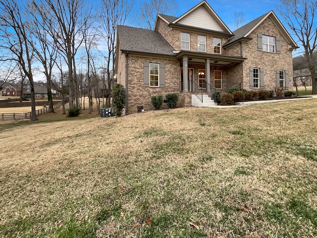 craftsman-style house featuring a front yard and a porch