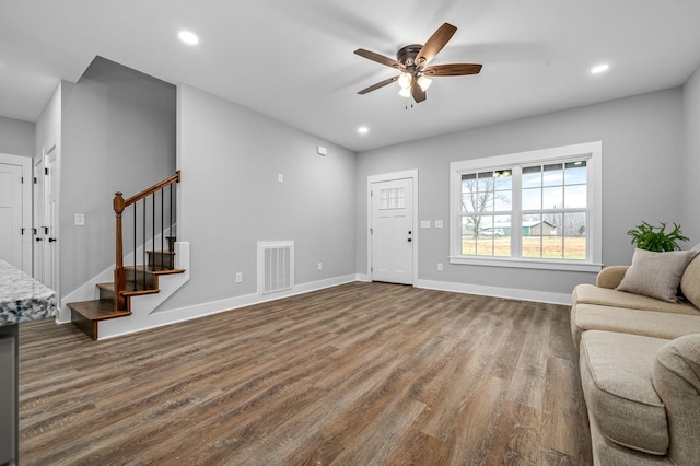 foyer featuring hardwood / wood-style flooring and ceiling fan