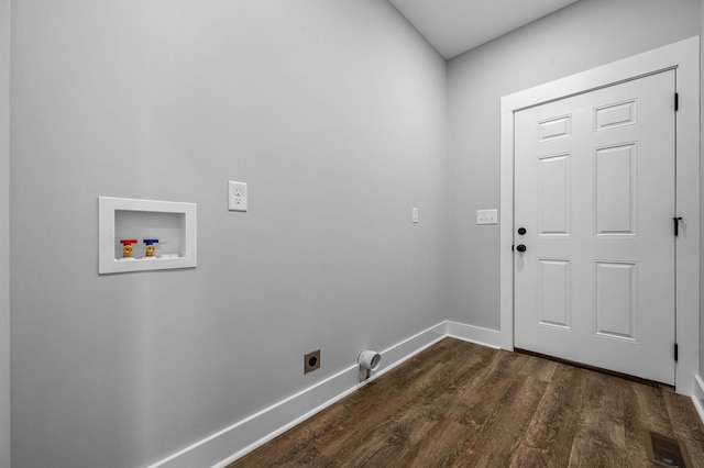 clothes washing area with washer hookup, dark hardwood / wood-style floors, and hookup for an electric dryer