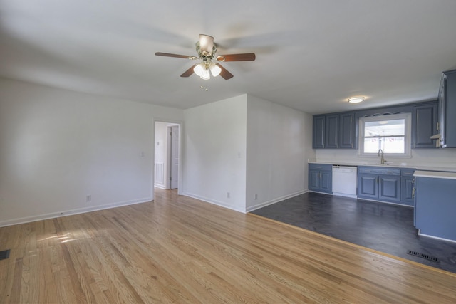 kitchen with hardwood / wood-style flooring, dishwasher, ceiling fan, and sink