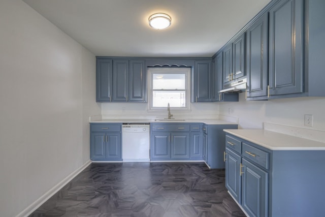 kitchen with blue cabinetry, dishwasher, and sink