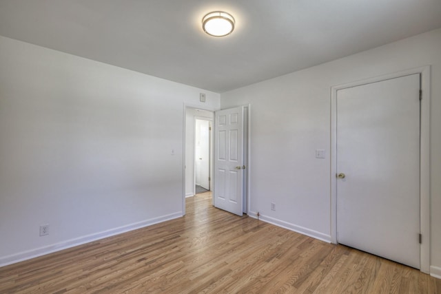 unfurnished bedroom featuring light hardwood / wood-style flooring