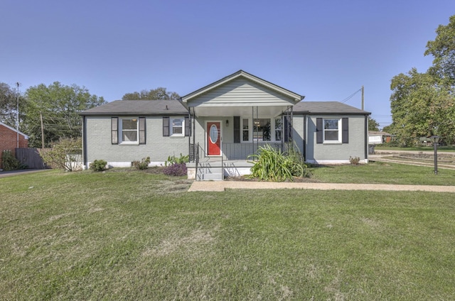 view of front facade featuring a front yard and a porch