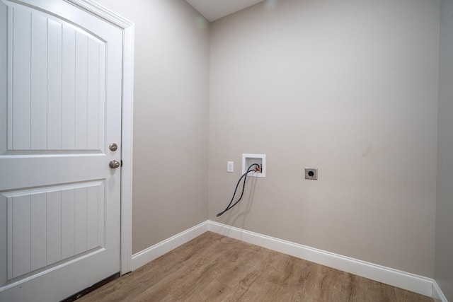 laundry room featuring light wood-type flooring, washer hookup, baseboards, hookup for an electric dryer, and laundry area