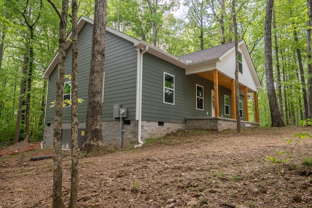 32 Periwinkle Ln, Leoma, TN 38468 - view of property exterior with roof with shingles, covered porch, and crawl space