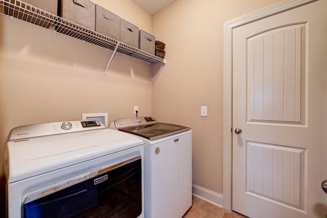 laundry room with washer and dryer