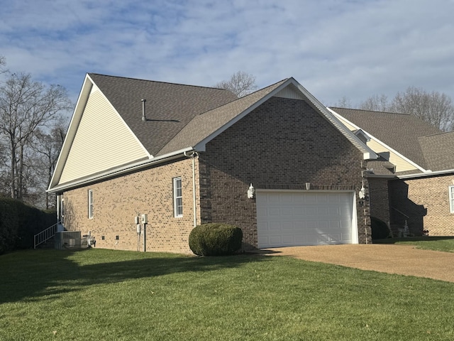 view of home's exterior with a yard and central air condition unit