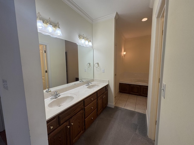 bathroom featuring a washtub, vanity, tile patterned floors, and crown molding