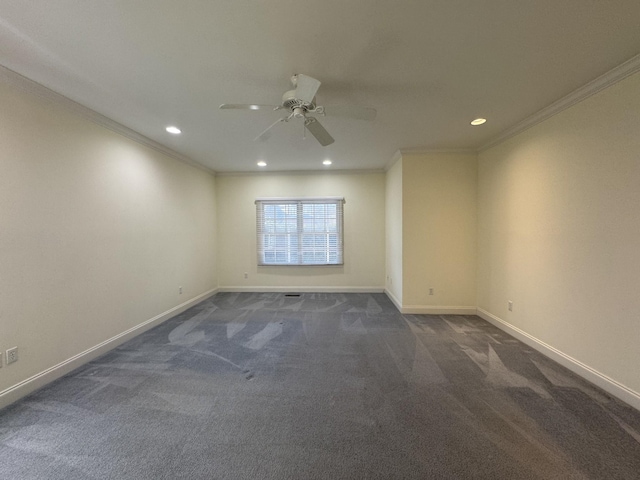 carpeted empty room with ceiling fan and ornamental molding