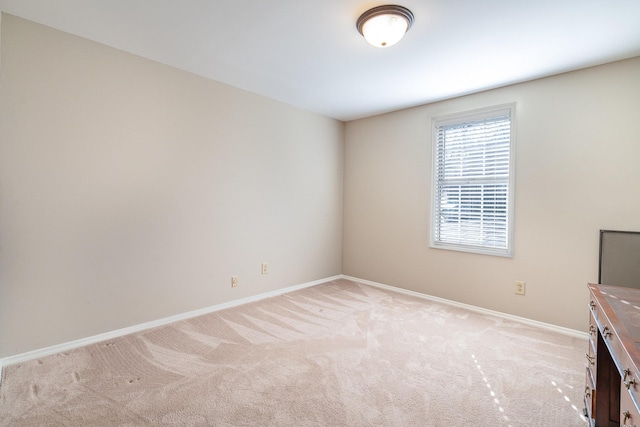 interior space featuring light carpet