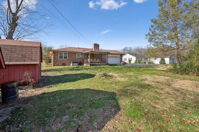 view of yard with a garage