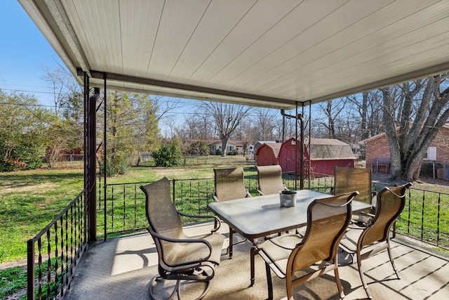 view of patio with a shed