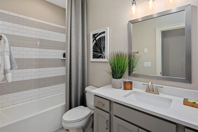 full bathroom with shower / bathtub combination with curtain, vanity, and toilet