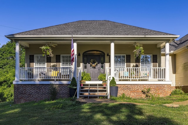 bungalow-style home featuring a front yard and a porch