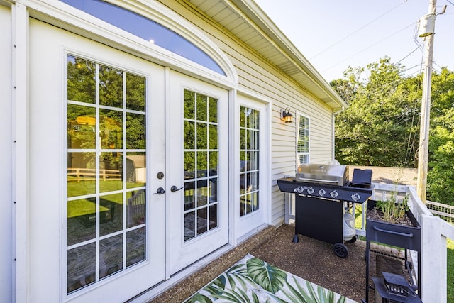 view of patio featuring area for grilling and french doors