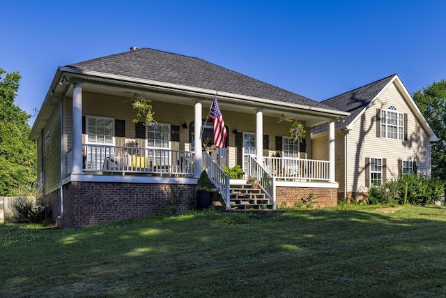 bungalow-style house with covered porch and a front yard