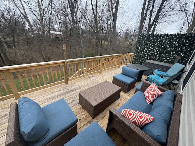 wooden deck featuring an outdoor living space