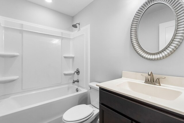 full bathroom featuring shower / bathing tub combination, vanity, and toilet