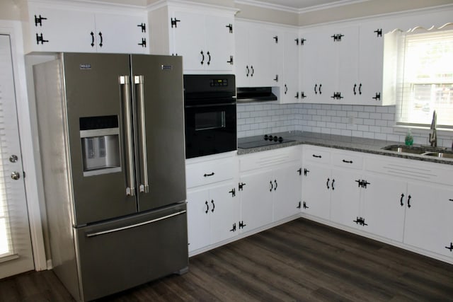 kitchen with white cabinets, sink, dark stone countertops, and black appliances