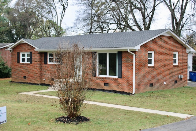 single story home with a front yard