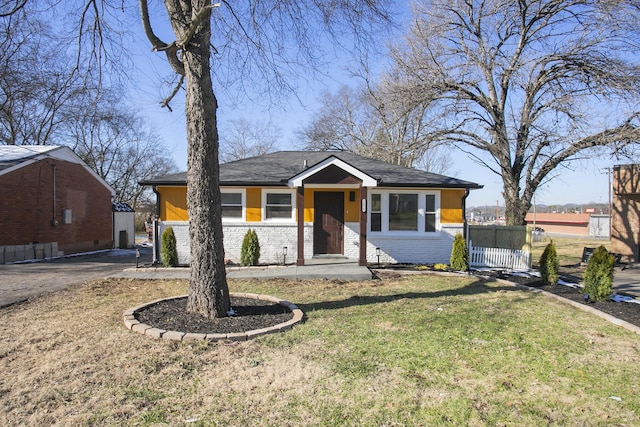 ranch-style house with a front yard