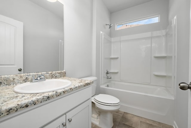 full bathroom with tile patterned flooring, vanity,  shower combination, and toilet