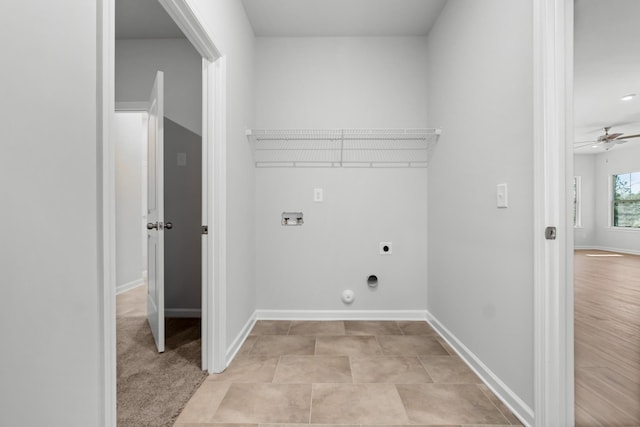 clothes washing area featuring ceiling fan, electric dryer hookup, gas dryer hookup, hookup for a washing machine, and light tile patterned floors