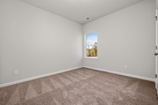 view of carpeted spare room