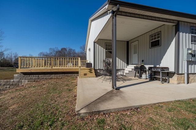 exterior space featuring a deck and a patio area