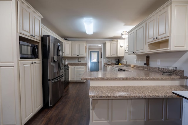 kitchen featuring kitchen peninsula, stainless steel fridge, dark hardwood / wood-style flooring, built in microwave, and white cabinets