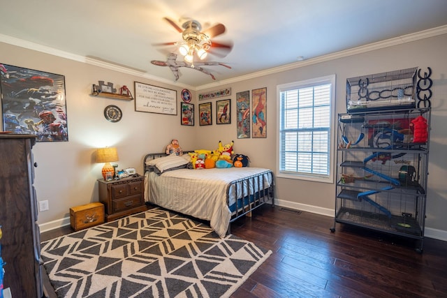 bedroom with dark hardwood / wood-style floors, ceiling fan, and ornamental molding