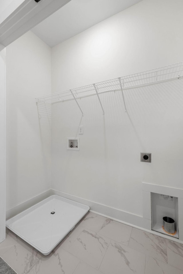 laundry area with washer hookup and hookup for an electric dryer