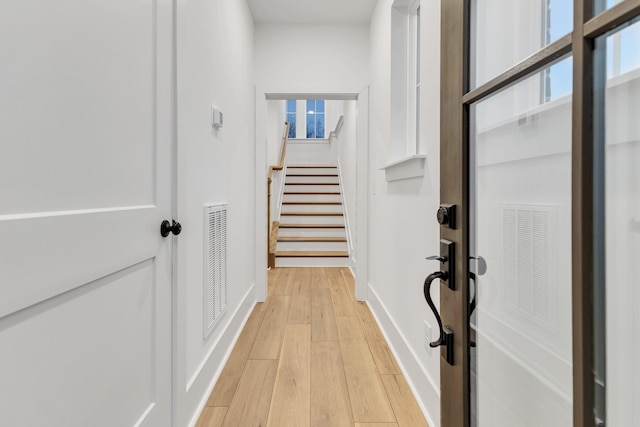 hallway featuring light wood-type flooring