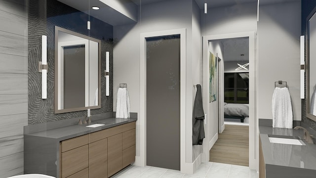 bathroom with vanity and tile patterned floors