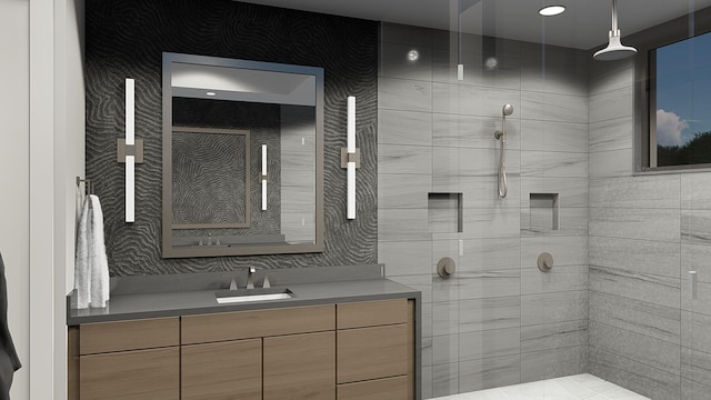 bathroom featuring vanity and walk in shower