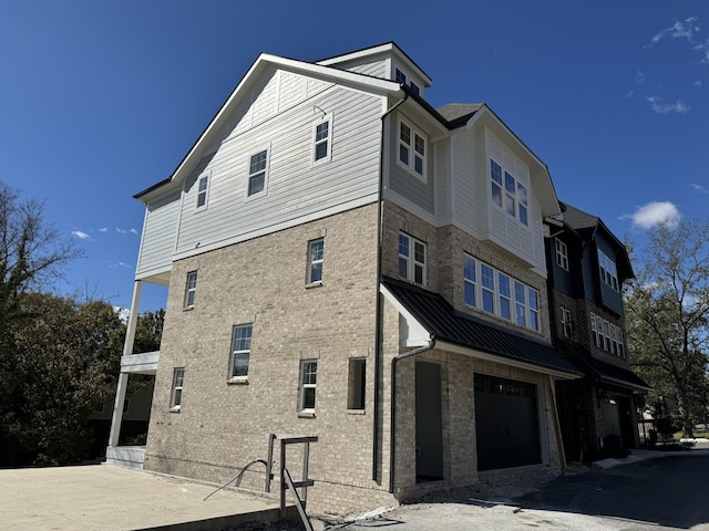 view of home's exterior with a garage