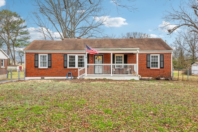 ranch-style house with a front lawn and covered porch