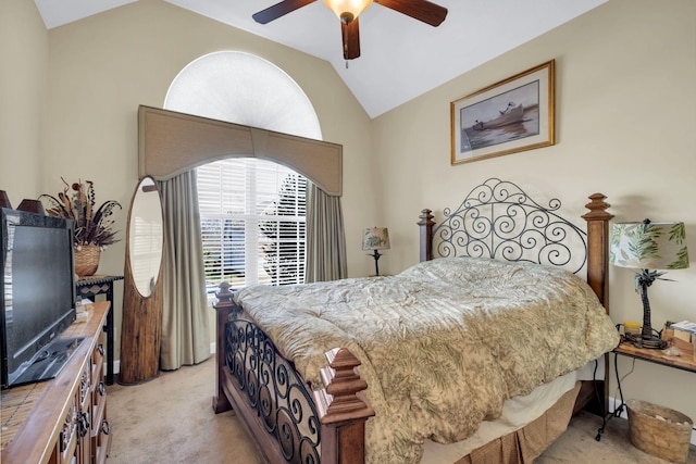 carpeted bedroom featuring vaulted ceiling and ceiling fan