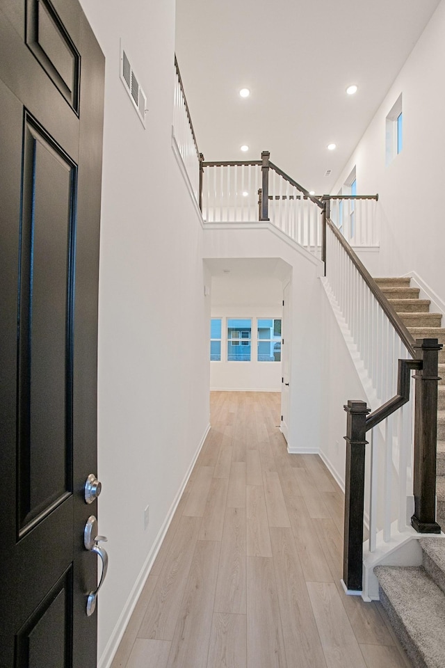 entryway featuring light wood-type flooring and plenty of natural light