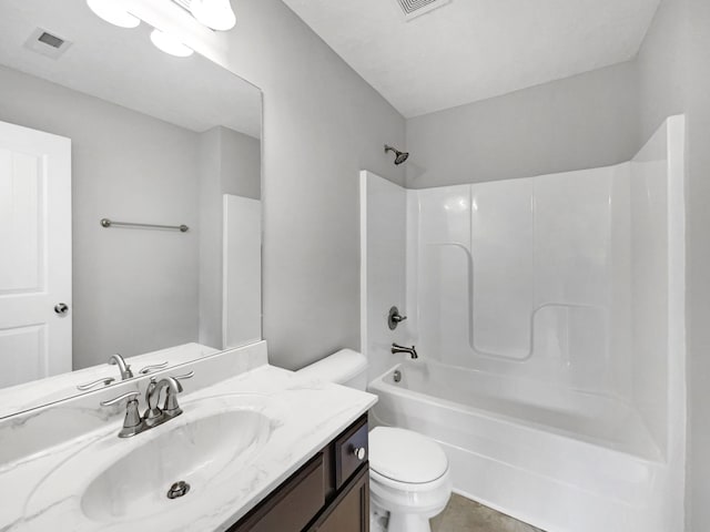 full bathroom with shower / tub combination, vanity, toilet, and tile patterned floors