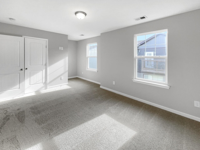 view of carpeted spare room