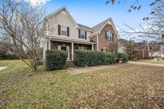 view of property featuring a front yard