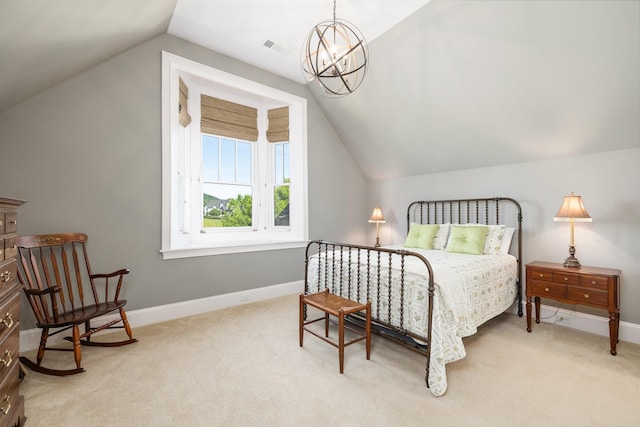 bedroom featuring vaulted ceiling, light carpet, and a chandelier