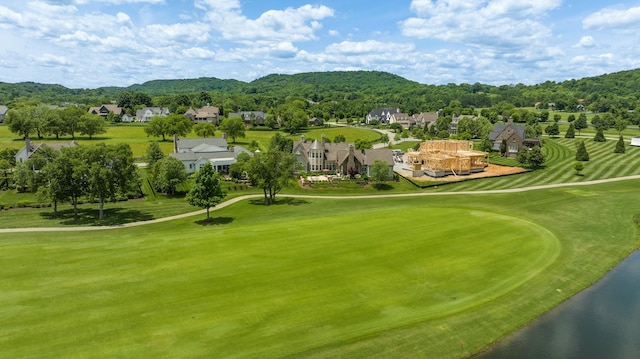 view of community with a water view