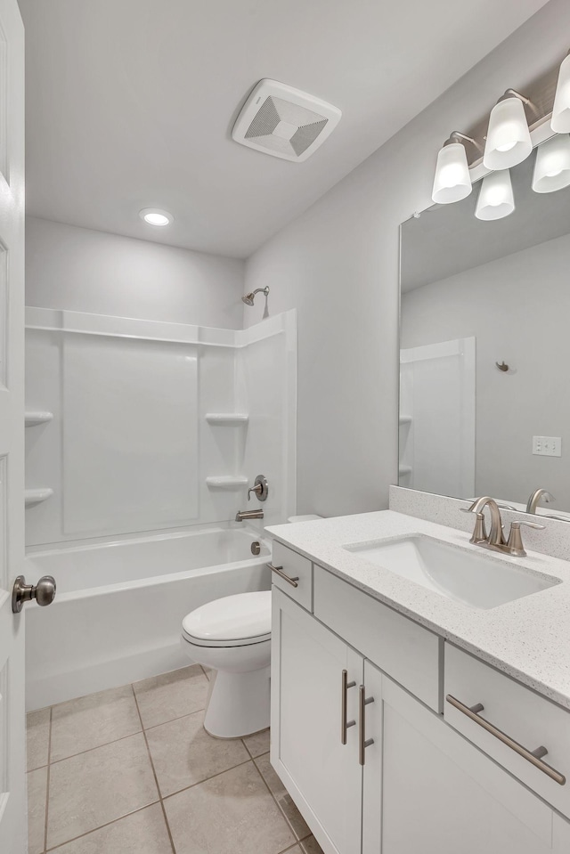 full bathroom featuring tile patterned flooring, vanity, shower / bathtub combination, and toilet